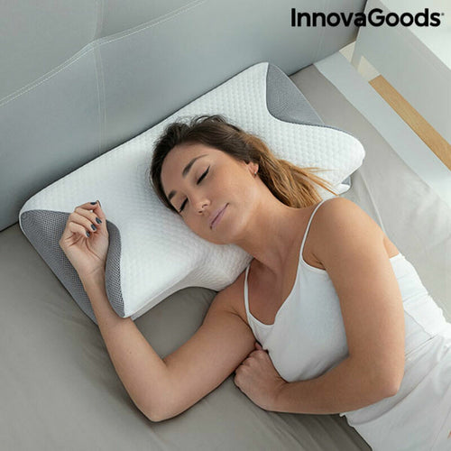 Woman sleeping on a white and grey contoured fabric pillow by InnovaGoods.